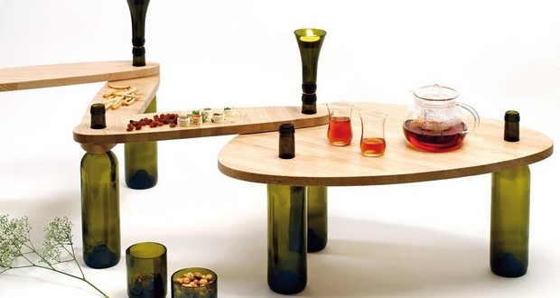 https://www.upcycled-wonders.com/wp-content/uploads/2014/03/reuse-glass-wine-bottles-table-upcycled-candle-holder-inspiring-idea-620x330.jpeg